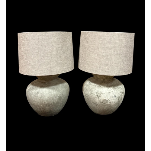 300 - TWO GREY CERAMIC TABLE LAMPS each of bulbous form with shades Each 57cm (h)