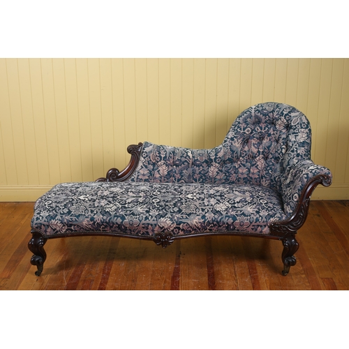 32 - A 19TH CENTURY CARVED MAHOGANY AND UPHOLSTERED CHAISE LONGUE the buttoned upholstered back an seat w... 