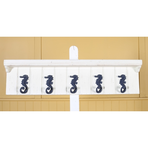 326 - A PINE WHITE PAINTED WALL MOUNTED COAT HANGER with five seahorse design hangers 22cm (h) x 89cm (w) ... 