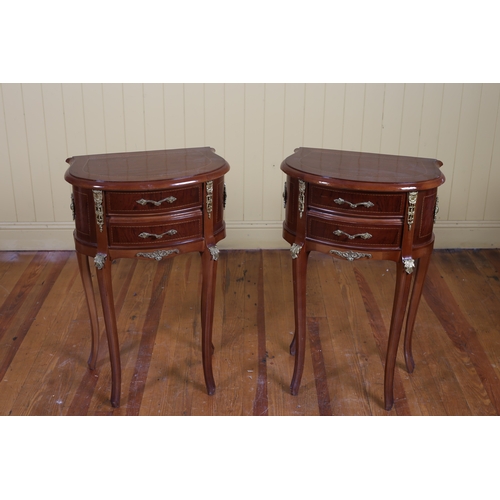 345 - A PAIR OF CONTINENTAL KINGWOOD AND GILT BRASS MOUNTED SIDE TABLES each of demi lune outline the shap... 