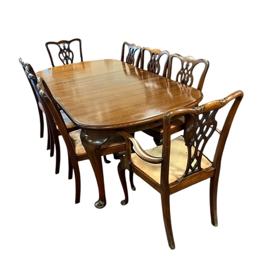 364 - A NINE PIECE MAHOGANY DINING ROOM SUITE comprising eight Chippendale style dining chairs, including ... 