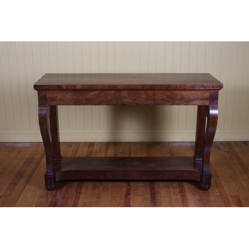 38 - A REGENCY MAHOGANY CONSOLE TABLE of rectangular outline the shaped top with frieze drawer raised on ... 