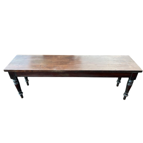 382 - A 19TH CENTURY MAHOGANY LOW TABLE of rectangular outline the shaped top above a moulded apron on bal... 