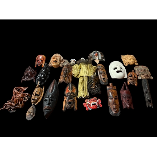 470 - A COLLECTION OF TRIBAL MASKS (19) together with A HARLEQUIN PORCELAIN DOLL 62cm (h), etc.