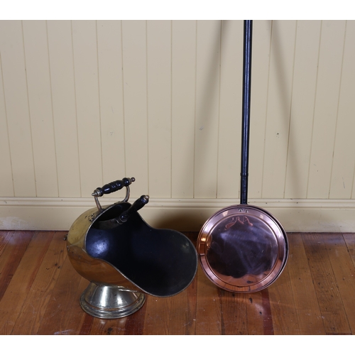 50 - A 19TH CENTURY COPPER COAL HELMET with shovel inscribed 'Maguire and Gatchell Limited Dublin', A COP... 