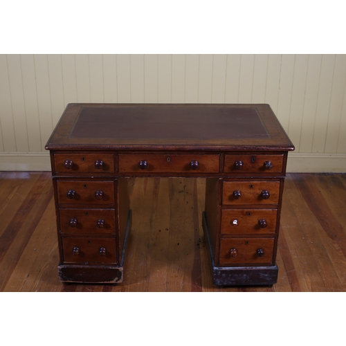 51 - A 19TH CENTURY MAHOGANY PEDESTAL DESK of rectangular outline the shaped top with tooled leather inse... 