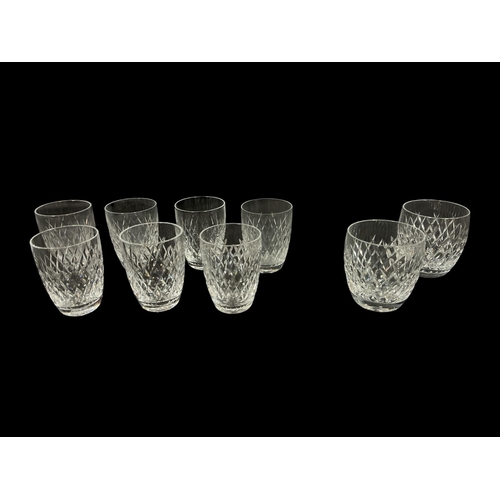 554 - A SET OF SEVEN WATERFORD CUT GLASS TUMBLERS together with A PAIR OF WATERFORD CUT GLASS TUMBLERS (9)