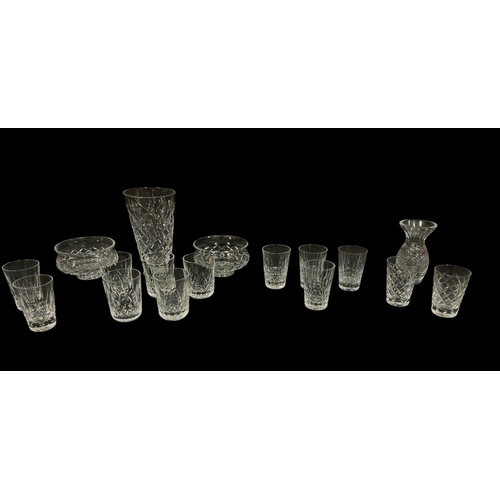 557 - A COLLECTION OF GLASSES to include a set of five Waterford cut glass tumblers, a set of four Waterfo... 