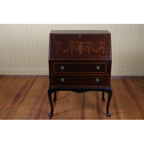 19 - A VINTAGE MAHOGANY INLAID BUREAU the hinged writing slope inlaid with ribbon tied swags with pigeonh... 