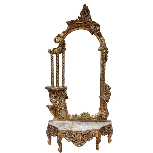 17 - A CONTINENTAL CARVED GILTWOOD CONSOLE TABLE AND MIRROR the rectangular arched plate within a foliate... 