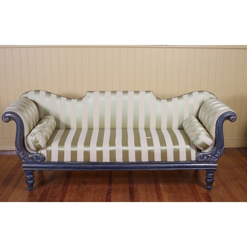 64 - A CONTINENTAL GILTWOOD AND UPHOLSTERED DOUBLE SCROLLED END SETTEE the shaped upholstered back and se... 