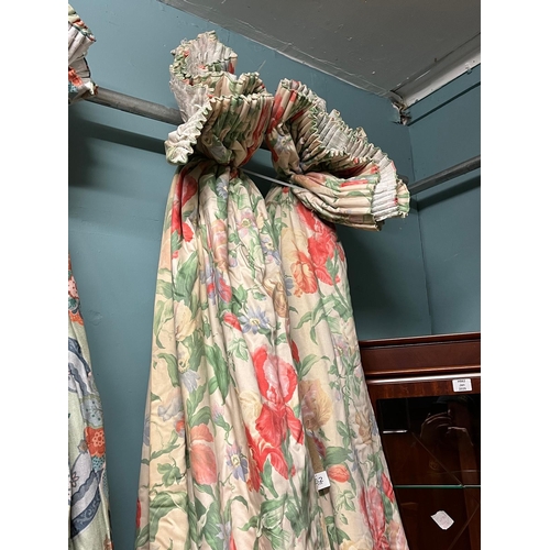 652 - A PAIR OF MULTIFLORAL CURTAINS lined and interlined Each 216cm drop x 400cm (w)