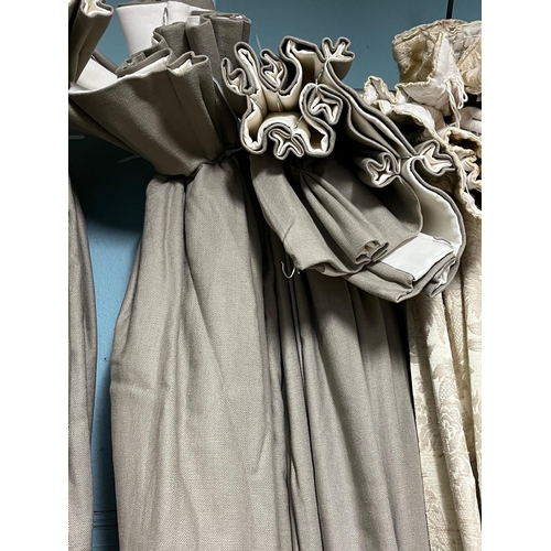 655 - A PAIR OF LIGHT BROWN CURTAINS lined and interlined Each 210cm drop x 250cm (w)