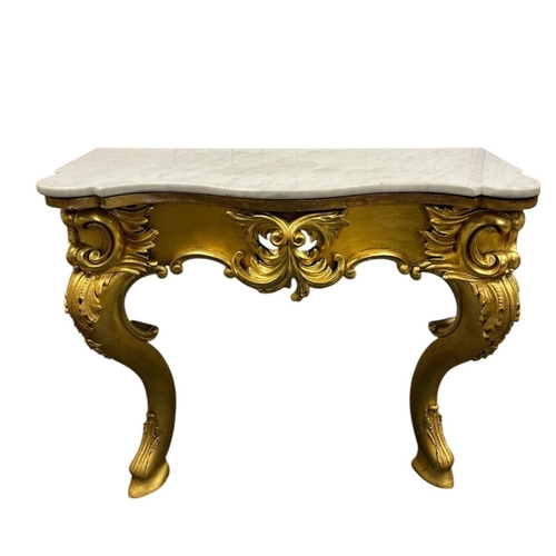 A GOOD 19TH CENTURY CARVED GILTWOOD AND MARBLE CONSOLE TABLE of serpentine outline surmounted by a white veined marble top above a pierced C-scroll and foliate carved apron on front cabriole supports with scroll toes 82cm (h) x 96cm (w) x 42cm (d)