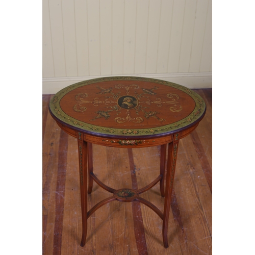 AN EDWARDIAN SATINWOOD AND PAINTED TABLE of oval outline decorated overall with flowerheads and foliage on square tapering splayed legs joined by cross stretchers 72cm (h) x 66cm (w) x 48cm (d) together with an Edwardian satinwood pained side chair (2)