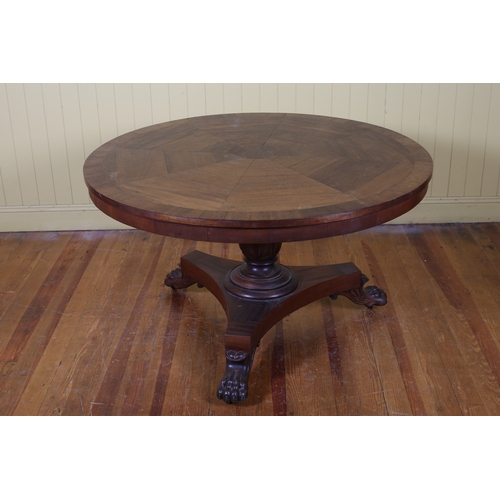 A 19TH CENTURY MAHOGANY POD TABLE the circular segmented top with broad ...