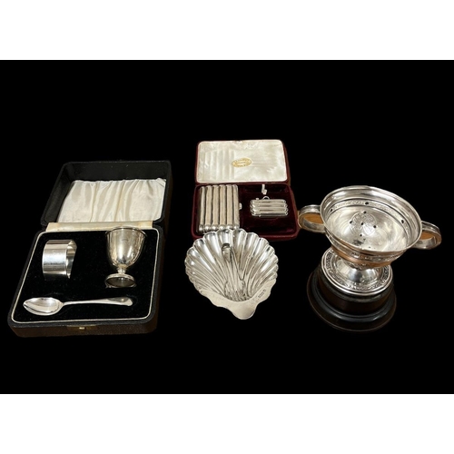 A SILVER CIGARETTE CASE AND VESTA CASE en suite, etc.