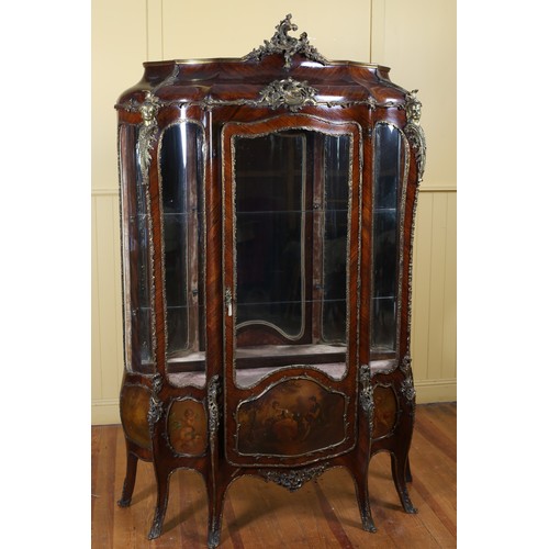 A 19TH CENTURY KINGWOOD GILT BRASS MOUNTED AND PAINTED CHINA DISPLAY CABINET of bombe outline the cavetto frieze above a bowed glazed door flanked by convex glazed panels between projecting angles with figural brass mounts on cabriole legs 204cm (h) x 140cm (w) x 47cm (d)