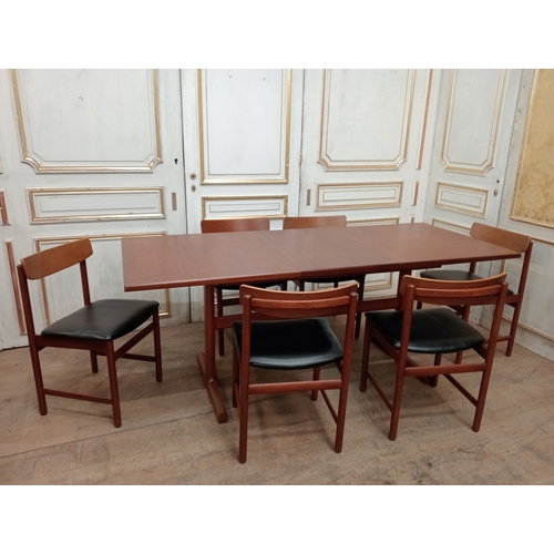 410 - A VINTAGE TEAK SEVEN PIECE DINING ROOM SUITE comprising six chairs each with a curved top rail and u... 