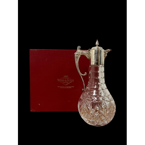 A WATERFORD CUT GLASS AND SILVER MOUNTED CLARET JUG 28cm (h) in original presentation box inscribed 'Weir & Sons Ltd'