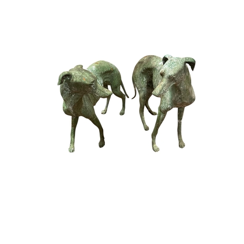 117 - A PAIR OF BRONZE FIGURES each modelled as a whippet shown standing 77cm (h) x 71cm (w)