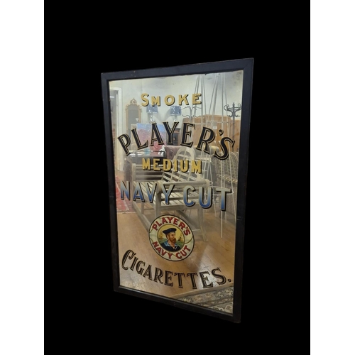 158 - A VINTAGE PLAYER'S ADVERTISEMENT MIRROR inscribed 'Smoke Player's Medium Navy Cut Cigarettes' In ebo... 
