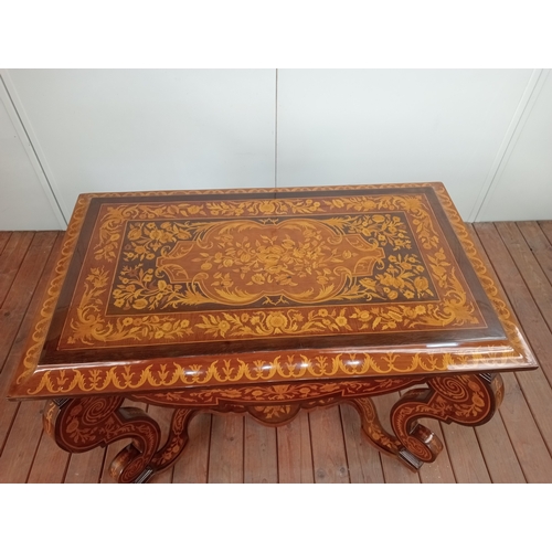 31 - A CONTINENTAL KINGWOOD AND MARQUETRY CENTRE TABLE of rectangular outline the shaped top above a shap... 