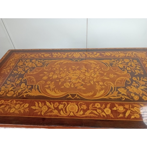 31 - A CONTINENTAL KINGWOOD AND MARQUETRY CENTRE TABLE of rectangular outline the shaped top above a shap... 
