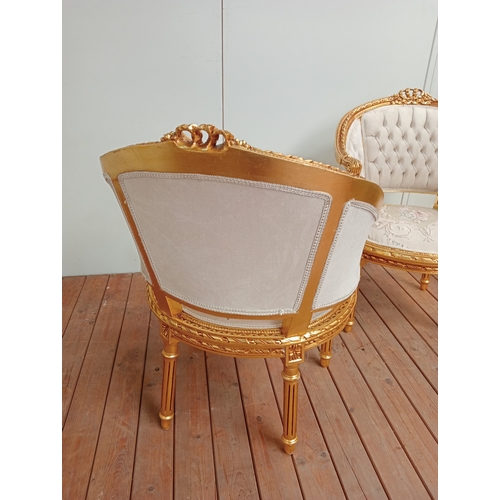 59 - A PAIR OF CONTINENTAL CARVED GILTWOOD AND UPHOLSTERED TUB SHAPED ARMCHAIRS each with a ribbon tied a... 