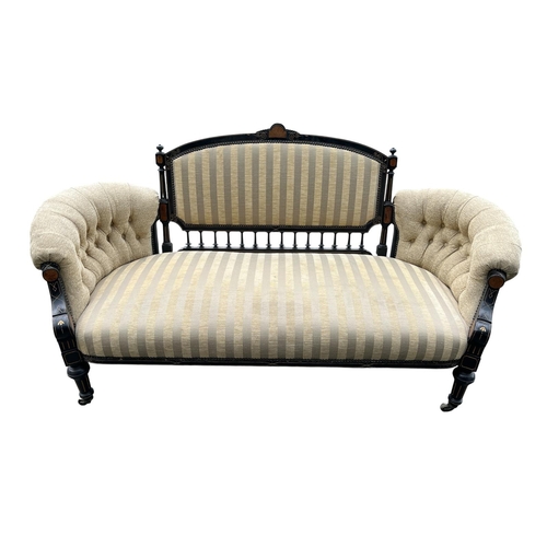 221 - A 19TH CENTURY EBONISED BURR WALNUT AND PARCEL GILT SETTEE the shaped top rail with upholstered pane... 