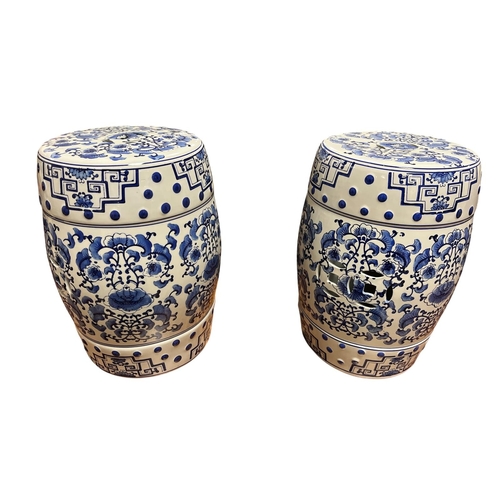 224 - A PAIR OF ORIENTAL BLUE AND WHITE MANDARIN SEATS the white ground decorated with stylised flowerhead... 