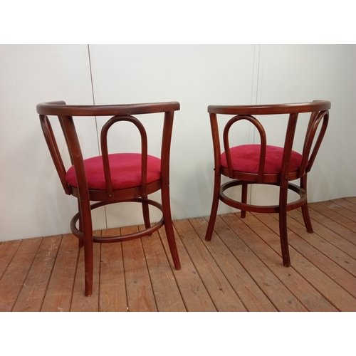 83 - A PAIR OF THONET BENTWOOD TUB SHAPED ELBOW CHAIRS with upholstered seats 76cm (h) x 61cm (w) x 54cm ... 