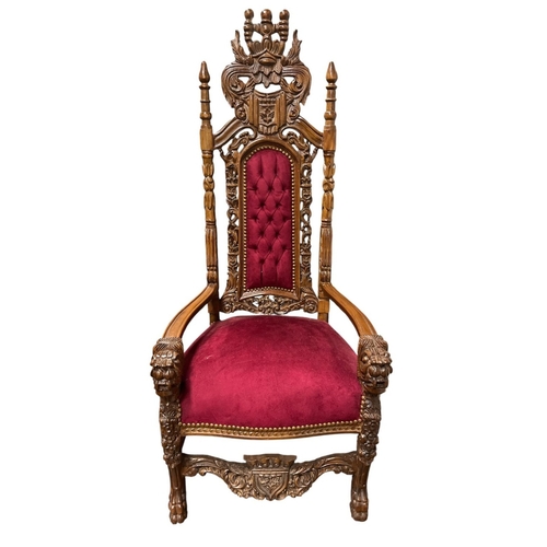 86 - A RENAISSANCE STYLE RED VELVET AND STAINED HARDWOOD CHAIR with foliate carved and pierced cresting a... 