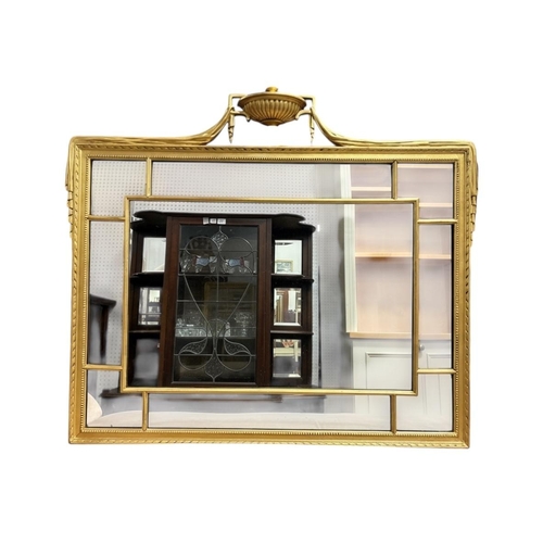 114 - A CONTINENTAL GILT FRAME MIRROR the compartmented plate within a beadwork moulded frame with neo-cla... 
