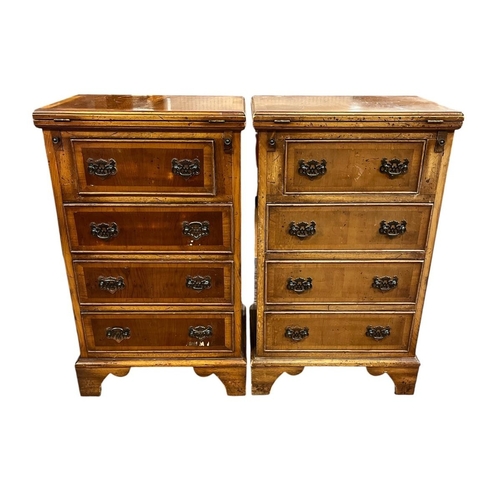 66 - A PAIR OF YEW WOOD BACHELOR'S CHESTS each of rectangular outline the hinged tops with tooled leather... 