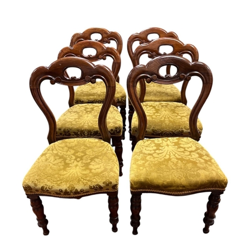71 - A SET OF SIX VICTORIAN MAHOGANY DINING CHAIRS each with a shaped pierced top rail with scroll decora... 