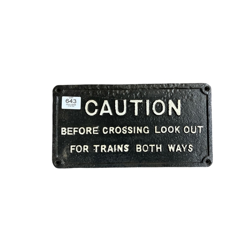 643 - A CAST IRON RAILWAY CAUTION SIGN 20cm (h) x 38.5cm (w)