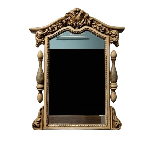 707 - A CONTINENTAL CREAM PAINTED MIRROR the shaped bevelled glass plate within a moulded frame flanked by... 