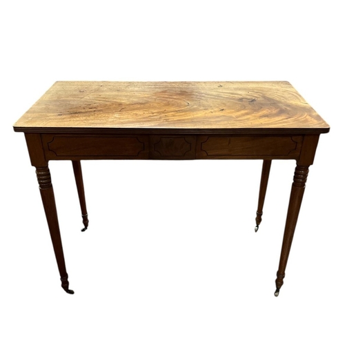 295 - A 19TH CENTURY MAHOGANY SIDE TABLE of rectangular outline the shaped top with reeded rim on ring tur... 