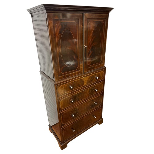 452 - AN EDWARDIAN MAHOGANY AND SATINWOOD INLAID CUPBOARD ON CHEST by Maple & Co. London & Paris the denti... 