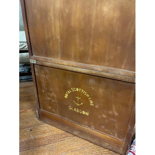 497 - A FINE WALNUT AND BRASS BOUND CAMPAIGN STYLE DRINKS CABINET of rectangular form the shaped top above... 