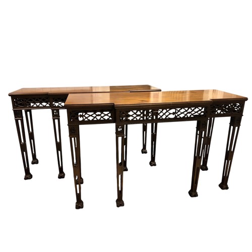507 - A PAIR OF LATE 19TH CENTURY CHIPPENDALE STYLE CONSOLE TABLES each of breakfront outline the shaped t... 