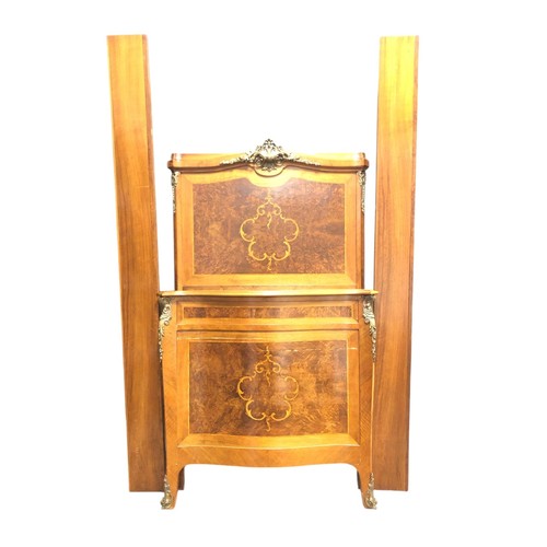 556 - A FINE PAIR OF FRENCH WALNUT, MAHOGANY, SATINWOOD AND GILT BRASS MOUNTED TWIN BEDS each with a recta... 