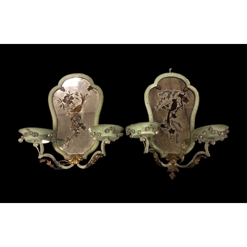 531 - A PAIR OF 19TH CENTURY CONTINENTAL GREEN PAINTED AND GILT BRASS GIRANDOLE MIRRORS the shaped plate d... 
