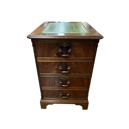 A MAHOGANY TWO DRAWER FILING CABINET the shaped top with tooled leather inset above two deep drawers with brass drop handles on bracket feet 78cm (h) x 52cm (w) x 62cm (d)