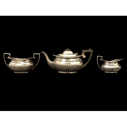 442 - ***WITHDRAWN***AN ENGLISH THREE-PIECE SILVER TEA SET Chester 1910, mark of George Nathan & Ridley Ha... 