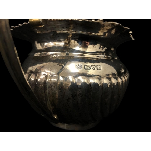 442 - ***WITHDRAWN***AN ENGLISH THREE-PIECE SILVER TEA SET Chester 1910, mark of George Nathan & Ridley Ha... 