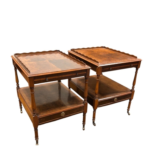 65 - A PAIR OF WALNUT LAMP TABLES each of rectangular form with moulded three quarter galleries with a br... 