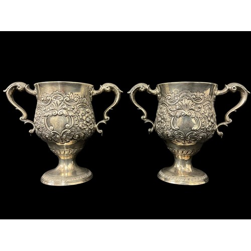 517 - A PAIR OF GEORGIAN IRISH SILVER TWIN-HANDLED CUPS Dublin 1784, maker's mark of Matthew West, of balu... 
