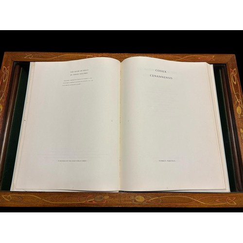 67 - BOOK OF KELLS 
Limited Edition No. 68 
Facsimile copies 
Three volumes 
In a fine mahogany inlaid di... 